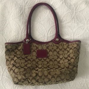 Coach purse with Purple trim!